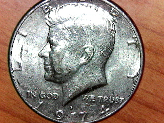 Kennedy-Half-With-Doubling-Letters-On-Half-Dollar-On-Reverse